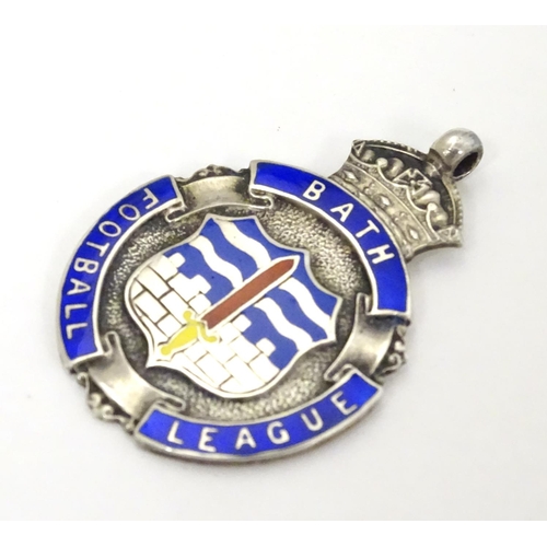 330 - Football Interest : A silver fob with enamel decoration and titled Bath Football League. Hallmarked ... 