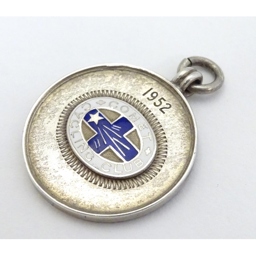 331 - Cycling Interest: A silver fob with enamel decoration for 'Comet Cycling Club ' and engraved ' Club ... 