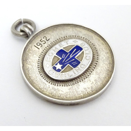 331 - Cycling Interest: A silver fob with enamel decoration for 'Comet Cycling Club ' and engraved ' Club ... 