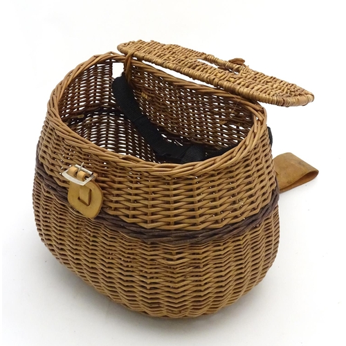 338 - Fishing : A freshwater Fly fisherman's leather and wicker fishing creel with shoulder strap and sing... 