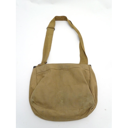 349 - Fishing : a vintage Tan canvas like and leather fishing bag with removable liner , shoulder strap an... 