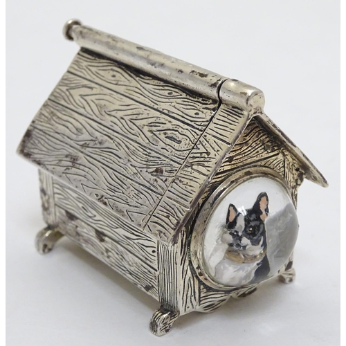 384 - A novelty silver vesta case formed as a dog kennel / dog house  with sprung action to roof, striker ... 