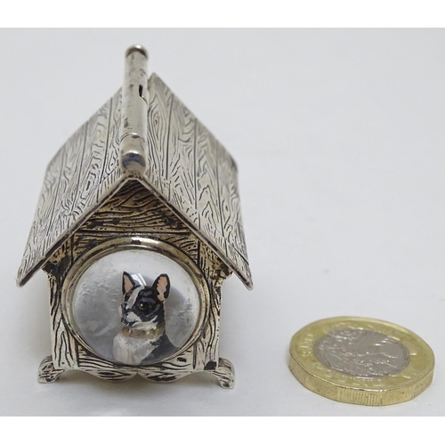 384 - A novelty silver vesta case formed as a dog kennel / dog house  with sprung action to roof, striker ... 