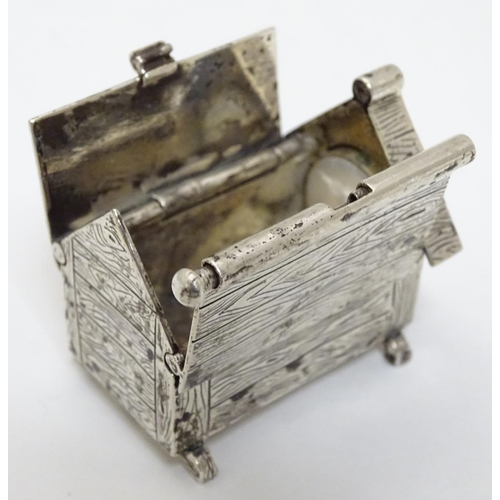 384 - A novelty silver vesta case formed as a dog kennel / dog house  with sprung action to roof, striker ... 