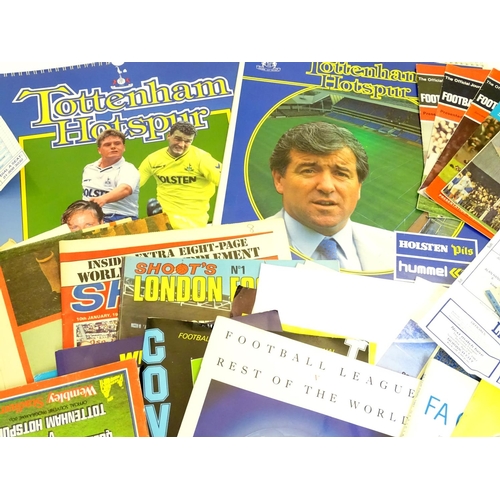 39 - A quantity of Tottenham Hotspur memorabilia to include official magazines, souvenir programmes,souve... 