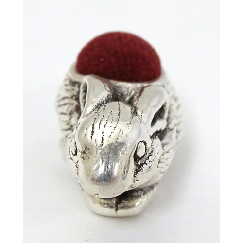 391 - A Novelty silver pin cushion formed as rabbit . Marked '925' . 1 1/2'' long