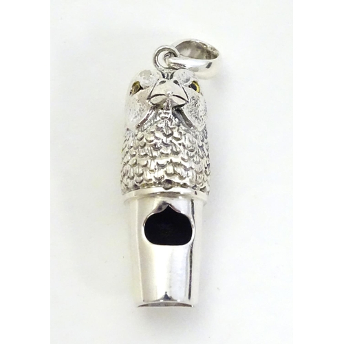 401 - Pheasant Shooting interest : A 21stC silver novelty whistle with pheasant head decoration 1 1/2'' hi... 