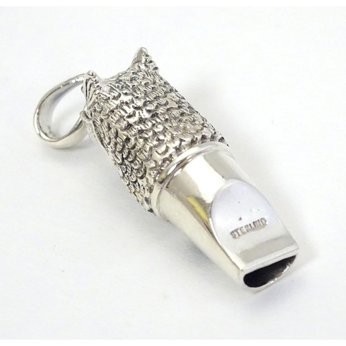 401 - Pheasant Shooting interest : A 21stC silver novelty whistle with pheasant head decoration 1 1/2'' hi... 