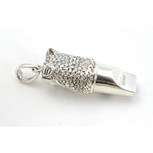 401 - Pheasant Shooting interest : A 21stC silver novelty whistle with pheasant head decoration 1 1/2'' hi... 