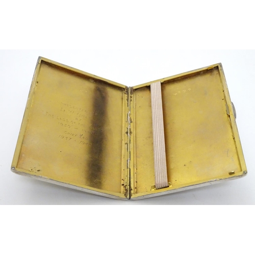 404 - A silver cigarette case hallmarked Birmingham 1939 with later applied ceramic cabochon to front depi... 