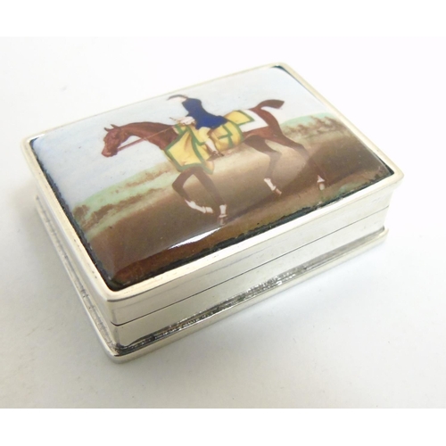 460 - A pill box having enamel decoration to top depicting horse and rider, 1 3/4'' x 1'' x 1/2''