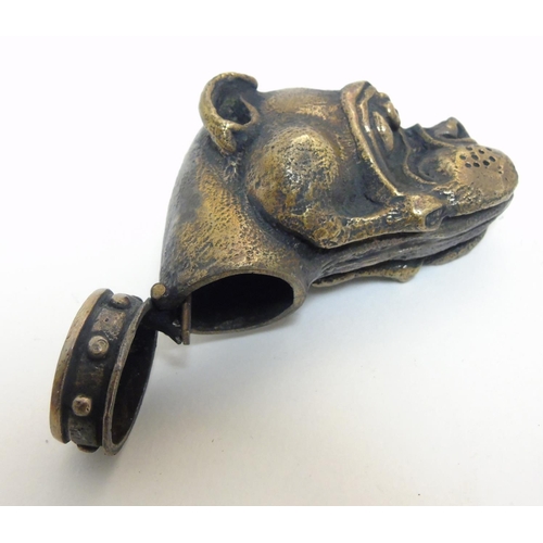 465 - A novelty vesta case formed at the head of a dog. Approx 1 1/4'' high