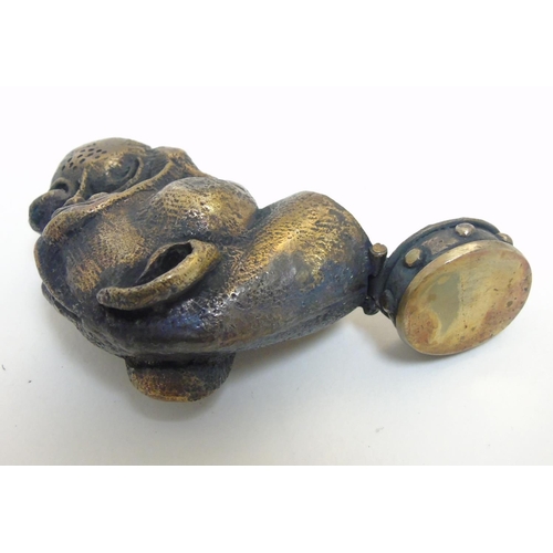 465 - A novelty vesta case formed at the head of a dog. Approx 1 1/4'' high