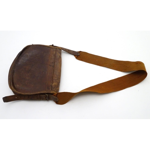 501 - Shooting: A vintage leather Payne Gallwey-type cartridge bag, with canvas shoulder strap and provisi... 