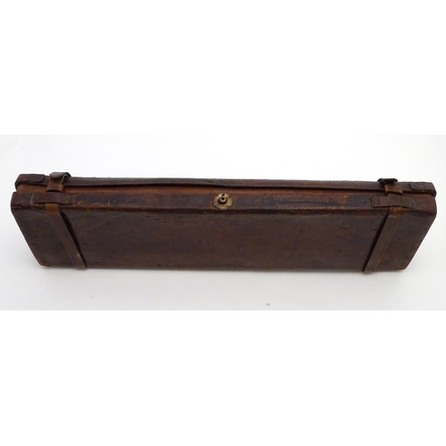 505 - Shooting: A vintage leather gun motor case, with bramah lock, dual straps and carrying handle, the i... 