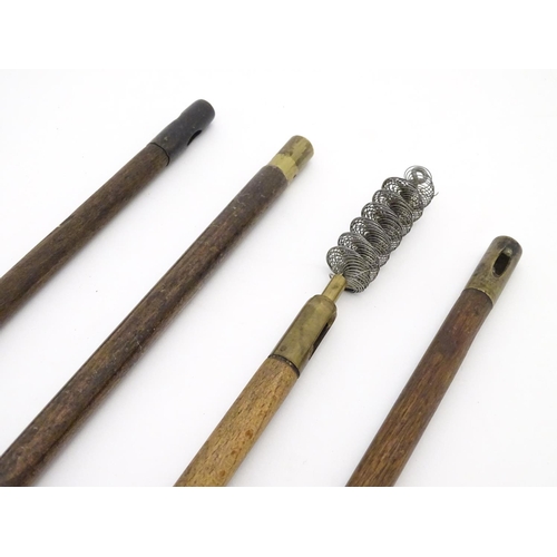 511 - Shooting: A collection of four antique shotgun cleaning rods, comprising a one-piece beech example w... 