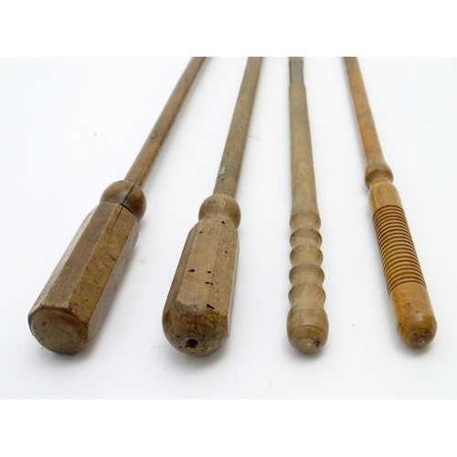 513 - Shooting: A collection of four antique shotgun cleaning rods, comprising 2 one-piece beech examples ... 