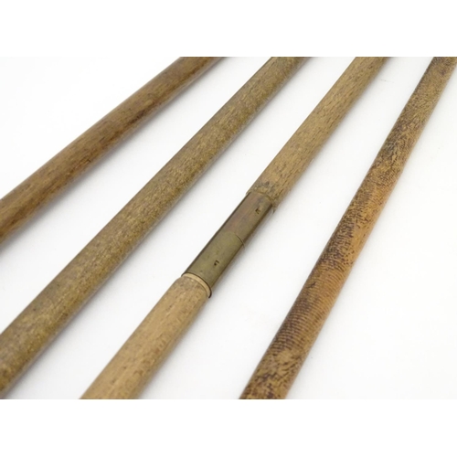 513 - Shooting: A collection of four antique shotgun cleaning rods, comprising 2 one-piece beech examples ... 