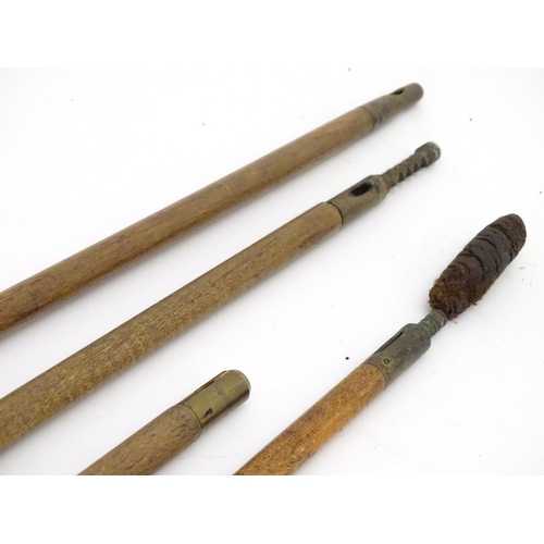 513 - Shooting: A collection of four antique shotgun cleaning rods, comprising 2 one-piece beech examples ... 