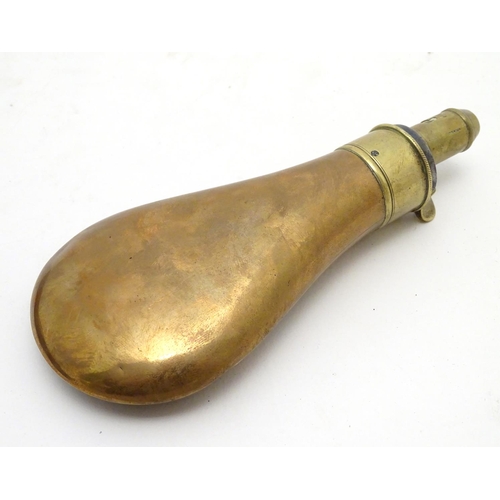 517 - Shooting: A 19thC G & J. W. Hawksley powder flask, of copper and brass construction with dram measur... 