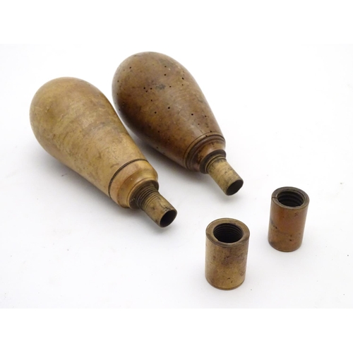 519 - Shooting: Two 18thC Continental turned wooden powder flasks, of boxwood construction, each of bulbou... 