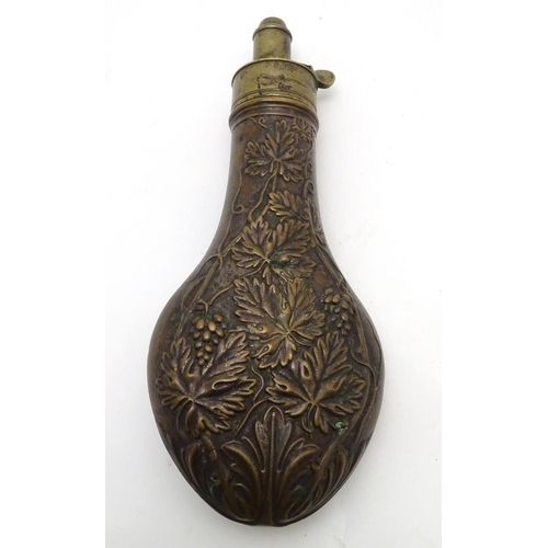 520 - Shooting: A 19thC G & J. W. Hawksley powder flask, of copper and brass construction with dram measur... 