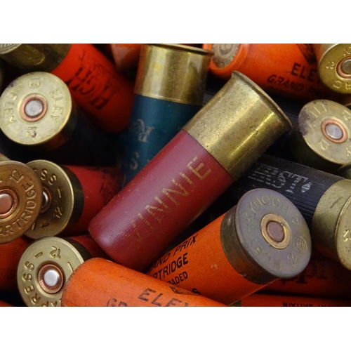 562 - Shooting: An assortment of c100 collectable, paper cased and modern 12 bore shotgun cartridges by El... 