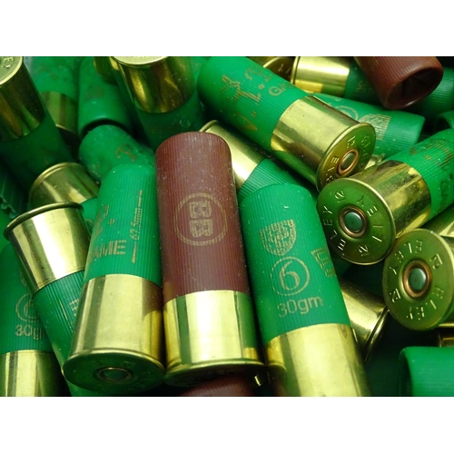 563 - Shooting: A quantity of 12 bore game and clayshooting cartridges, to include Eley 'VIP' 30g 6s, Hull... 