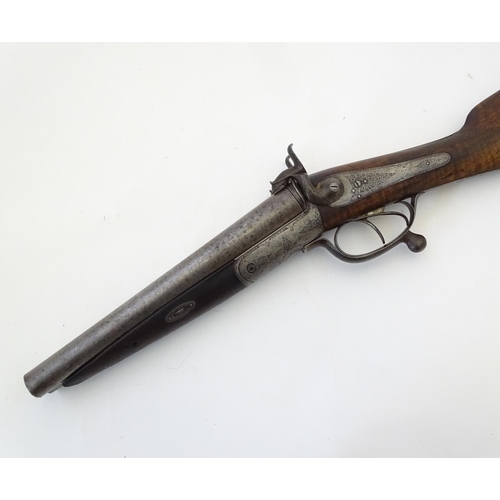 566 - A Victorian 12 (13) bore Pinfire side by side shotgun by Barker & Co, Birmingham & London.  The back... 