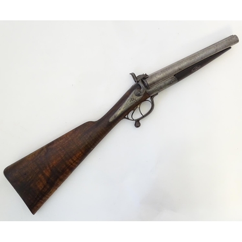 566 - A Victorian 12 (13) bore Pinfire side by side shotgun by Barker & Co, Birmingham & London.  The back... 