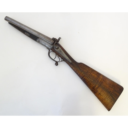 566 - A Victorian 12 (13) bore Pinfire side by side shotgun by Barker & Co, Birmingham & London.  The back... 