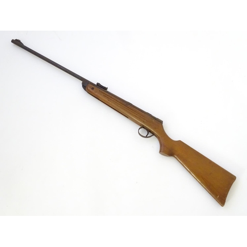 568 - Airgun: A 'Meteor' Mk1 .22 break-action air rifle by BSA, Birmingham.  18'' barrel with open adjusta... 