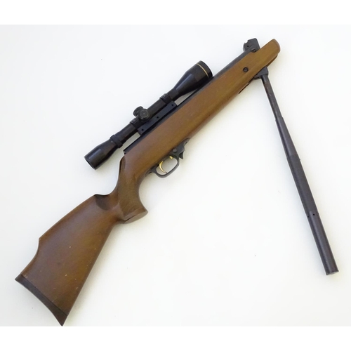 573 - Airgun: An 'HW90' .22 break-action air rifle by Weihrauch-Theoben, Germany.  21 1/2'' barrel (includ... 