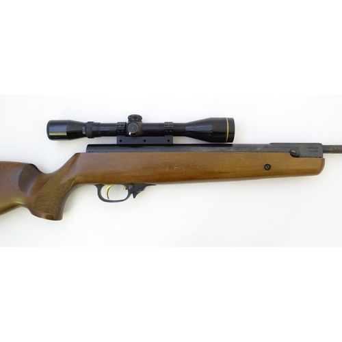 573 - Airgun: An 'HW90' .22 break-action air rifle by Weihrauch-Theoben, Germany.  21 1/2'' barrel (includ... 