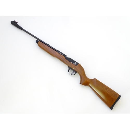 576 - Airgun: An 'XT501 Rabbit Destroyer' .22/5.5mm CO2 bolt-action air rifle by SMK, England.  21 3/4'' b... 