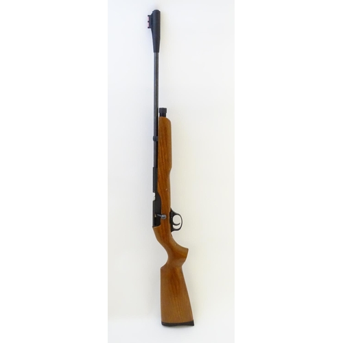 576 - Airgun: An 'XT501 Rabbit Destroyer' .22/5.5mm CO2 bolt-action air rifle by SMK, England.  21 3/4'' b... 