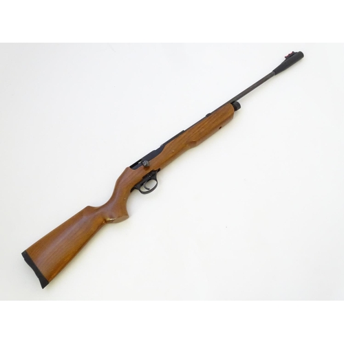 576 - Airgun: An 'XT501 Rabbit Destroyer' .22/5.5mm CO2 bolt-action air rifle by SMK, England.  21 3/4'' b... 