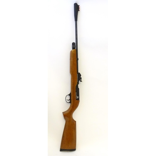 577 - Airgun: An 'XT501 Rabbit Destroyer' .22/5.5mm CO2 bolt-action air rifle by SMK, England.  21 3/4'' b... 