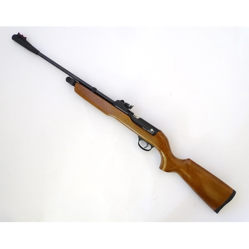 577 - Airgun: An 'XT501 Rabbit Destroyer' .22/5.5mm CO2 bolt-action air rifle by SMK, England.  21 3/4'' b... 