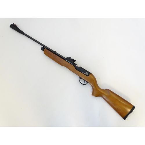 578 - Airgun: An 'XT501 Rabbit Destroyer' .22/5.5mm CO2 bolt-action air rifle by SMK, England.  21 3/4'' b... 