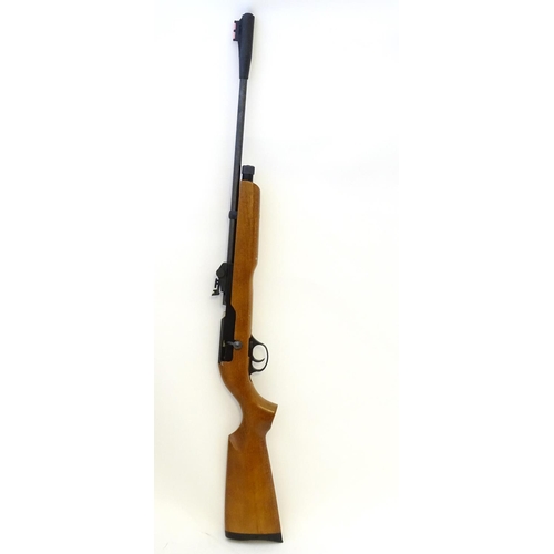 578 - Airgun: An 'XT501 Rabbit Destroyer' .22/5.5mm CO2 bolt-action air rifle by SMK, England.  21 3/4'' b... 