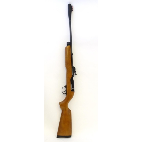 578 - Airgun: An 'XT501 Rabbit Destroyer' .22/5.5mm CO2 bolt-action air rifle by SMK, England.  21 3/4'' b... 