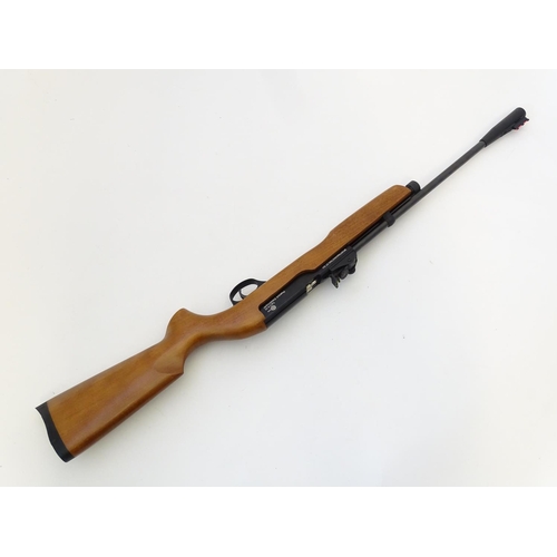 578 - Airgun: An 'XT501 Rabbit Destroyer' .22/5.5mm CO2 bolt-action air rifle by SMK, England.  21 3/4'' b... 