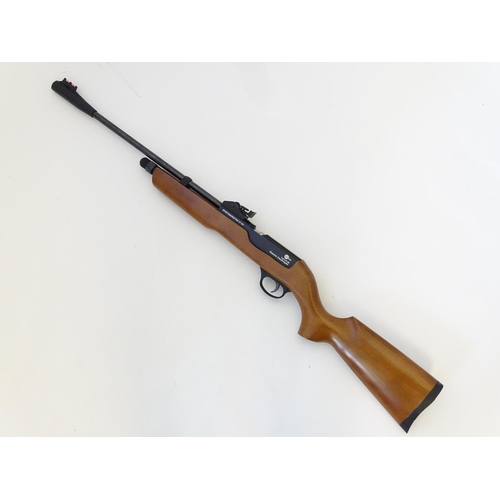 579 - Airgun: An 'XT501 Rabbit Destroyer' .22/5.5mm CO2 bolt-action air rifle by SMK, England.  21 3/4'' b... 