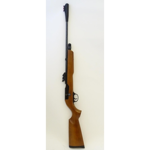 579 - Airgun: An 'XT501 Rabbit Destroyer' .22/5.5mm CO2 bolt-action air rifle by SMK, England.  21 3/4'' b... 