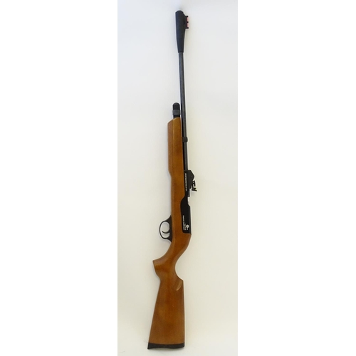 579 - Airgun: An 'XT501 Rabbit Destroyer' .22/5.5mm CO2 bolt-action air rifle by SMK, England.  21 3/4'' b... 