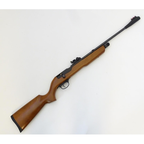 579 - Airgun: An 'XT501 Rabbit Destroyer' .22/5.5mm CO2 bolt-action air rifle by SMK, England.  21 3/4'' b... 