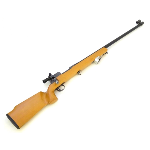 590 - Centrefire rifle: A .308 bolt-action single shot target rifle, stamped 'RE' (Mauser action.) 28 1/2'... 