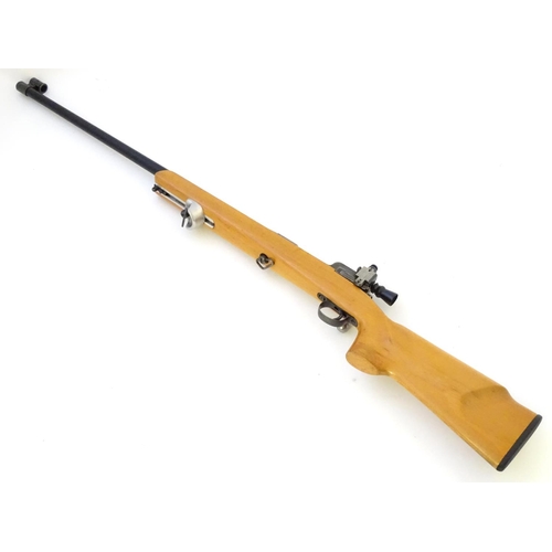 590 - Centrefire rifle: A .308 bolt-action single shot target rifle, stamped 'RE' (Mauser action.) 28 1/2'... 