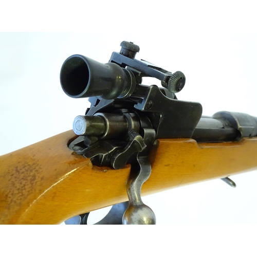 590 - Centrefire rifle: A .308 bolt-action single shot target rifle, stamped 'RE' (Mauser action.) 28 1/2'... 